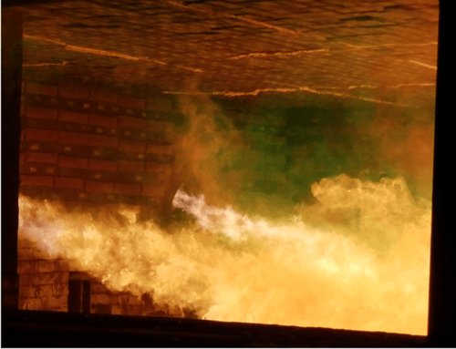 Intense flames and smoke billowing from a fire